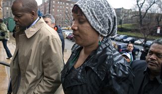 Nafissatou Diallo, who claimes she was sexually assaulted by former International Monetary Fund leader Dominique Strauss-Kahn, arrives at a courthouse in the Bronx borough of New York on Monday, Dec. 10, 2012. (AP Photo/Craig Ruttle)