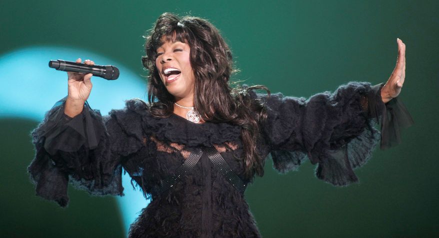 FILE - This Dec. 11, 2009 file photo shows Donna Summer performing at the Nobel Peace concert in Oslo, Norway. The eclectic group of rockers Rush and Heart, rappers Public Enemy, songwriter Randy Newman, "Queen of Disco" Donna Summer and bluesman Albert King will be inducted into the Rock and Roll Hall of Fame next April in Los Angeles. The inductees were announced Tuesday by 2012 inductee Flea of The Red Hot Chili Peppers at a news conference in Los Angeles. (AP Photo/John McConnico, file)
