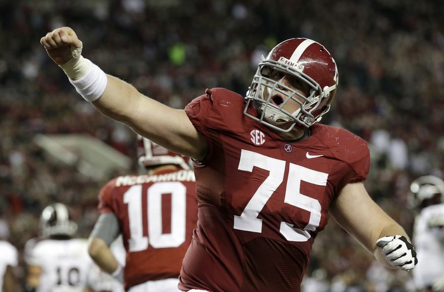 Alabama offensive lineman Barrett Jones (75) reacts after a Crimson Tide score during the first half of an NCAA college football game against Mississippi State at Bryant-Denny Stadium in Tuscaloosa, Ala., Saturday, Oct. 27, 2012. (AP Photo/Dave Martin)