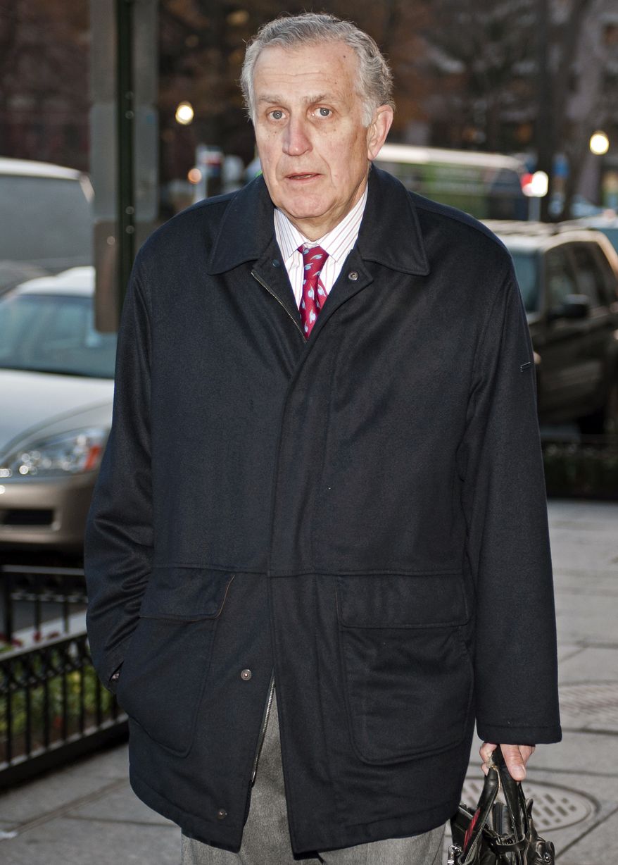 FILE - In this Nov. 30, 2012, file photo, former NFL commissioner Paul Tagliabue arrives at an attorney's office in Washington for a hearing on the bounty system of the New Orleans Saints NFL football team. Tagliabue, who was appointed to handle a second round of player appeals to the league, has informed all parties he planned to rule by Tuesday, Dec. 11_giving four players a ruling on whether their initial suspensions are upheld, reduced or thrown out. (AP Photo/Cliff Owen, File)