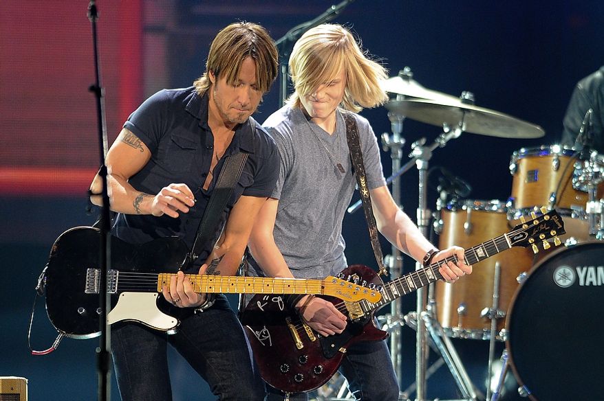 Keith Urban and the Grammy Camp Band perform during the American Country Awards on Monday, Dec. 10, 2012, in Las Vegas. (Al Powers/Powers Imagery/Invision/AP)