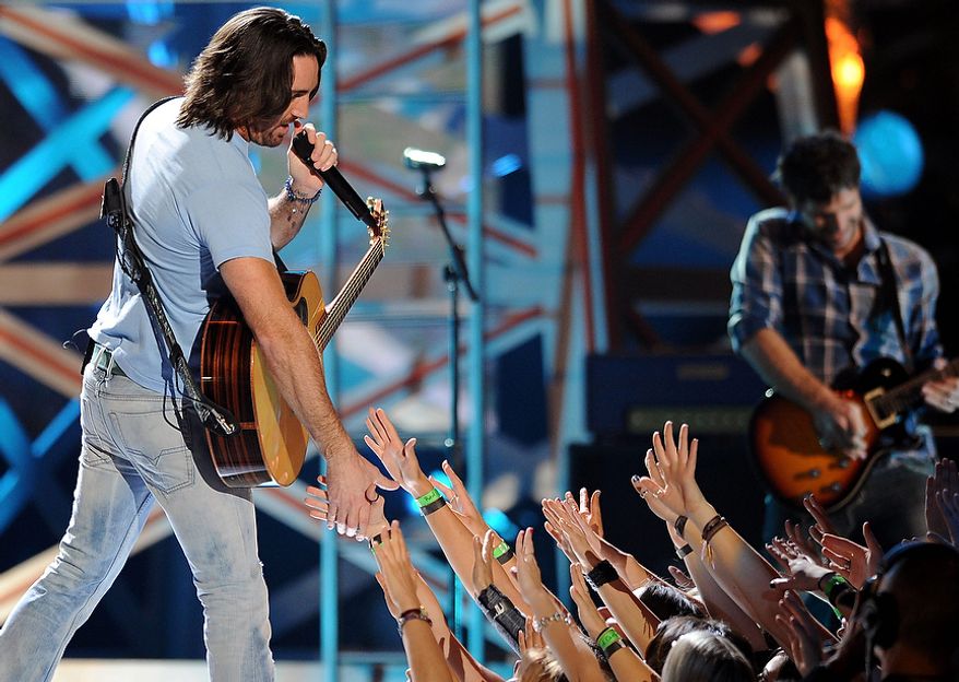 Jake Owen performs during the American Country Awards on Monday, Dec. 10, 2012, in Las Vegas. (Al Powers/Powers Imagery/Invision/AP)