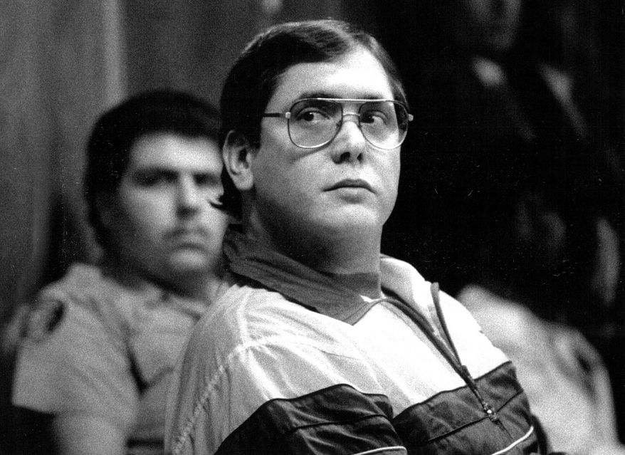 ** FILE ** Former Florida policeman Manuel Pardo, found guilty of nine counts of murder, listens as his sentence is read in 1998. (AP Photo/The Miami Herald, Marice Cohn Band)