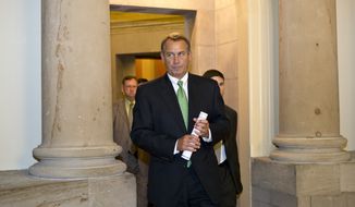 House Speaker John Boehner, Ohio Republican, leaves his office Dec. 11, 2012, and walks to the House floor on Capitol Hill in Washington to deliver remarks about negotiations with President Obama on the &quot;fiscal cliff.&quot; (Associated Press)