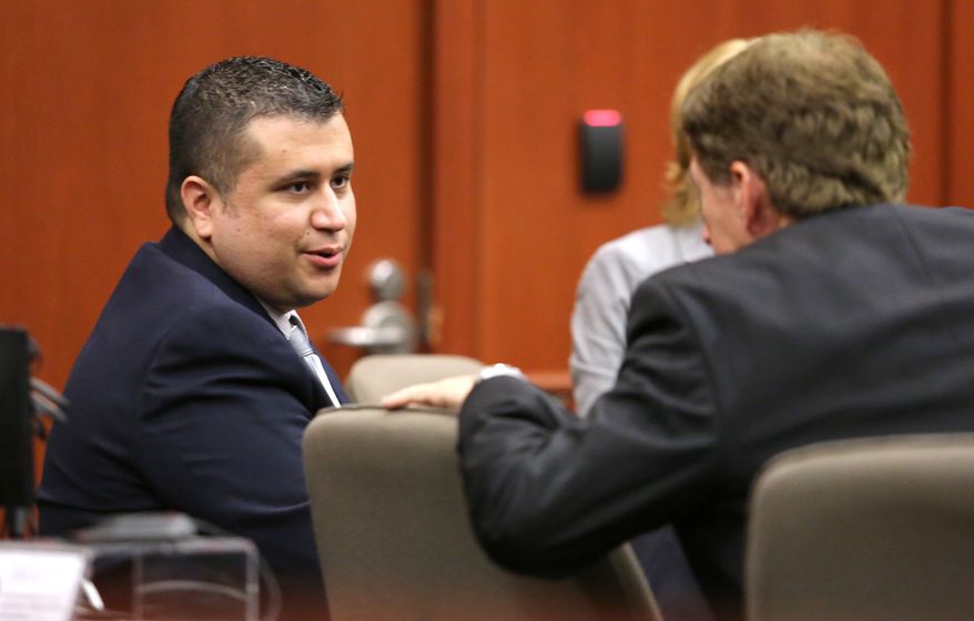 ** FILE ** George Zimmerman (left) talks with defense counsel Mark O'Mara during a court hearing at the Seminole County Courthouse on Tuesday, Dec. 11, 2012, in Sanford, Fla. (AP Photo/Orlando Sentinel, Joe Burbank, Pool)