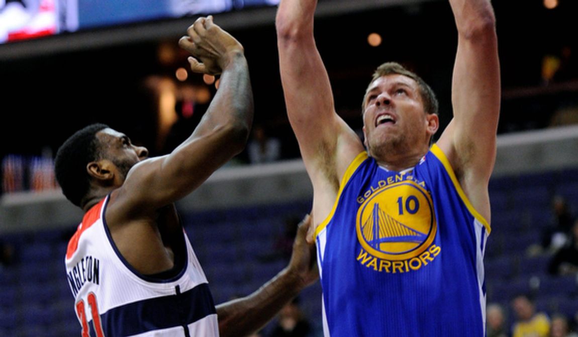 Golden State Warriors forward David Lee (10) goes to the basket against Washington Wizards forward Chris Singleton (31) during the first half of the Warriors&#x27; 101-97 win on Dec. 8, 2012, in Washington. (Associated Press)