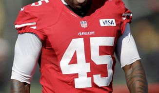 The 49ers suspended running back Brandon Jacobs on Monday for the final three games following a series of posts on social media sites addressing his lack of playing time, including one during the weekend saying he was &quot;on this team rotting away.&quot; (AP Photo/Paul Sakuma, File)