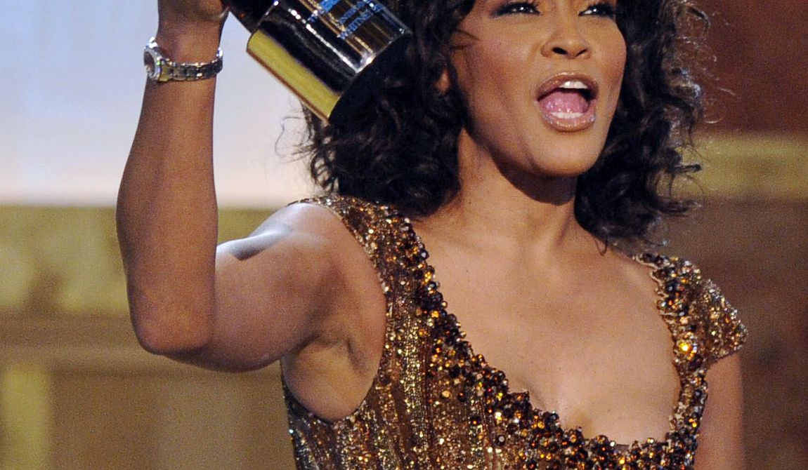 **FILE** Whitney Houston accepts an award at the Warner Theatre during the 2010 BET Hip Hop Honors in Washington on Jan. 16, 2010. (Associated Press)