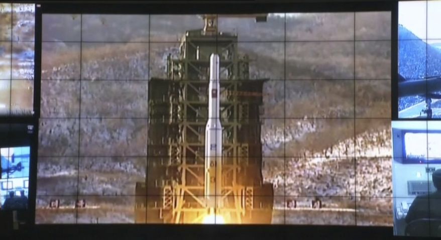 In this image made from video, displays show the Unha-3 rocket launch at North Korea's space agency's General Launch Command Center on the outskirts of Pyongyang, Wednesday, Dec. 12, 2012. (AP Photo via APTN)