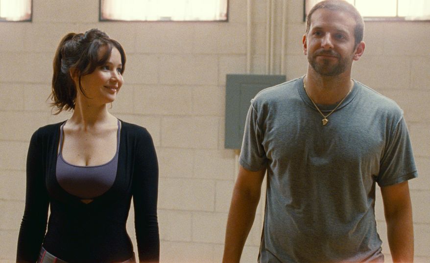 Jennifer Lawrence and Bradley Cooper star in the film "Silver Linings Playbook." (AP Photo/The Weinstein Co., JoJo Whilden)