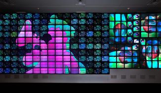 Nam June Paik, &quot;Megatron/Matrix&quot;, 1995, eight- 
channel video installation with custom electronics; 
color, sound, Smithsonian American Art Museum, 
Museum purchase made possible by Mr. and Mrs. 
Barney A. Ebsworth, Nelson C. White, and the Luisita 
L. and Franz H. Denghausen Endowment 