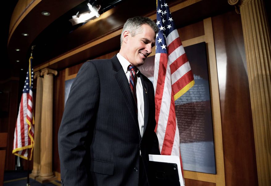 Sen. Scott P. Brown leaves town quietly after losing his re-election bid last month in Massachusetts. He delivered a farewell address to the Senate on Wednesday. (Associated Press)
