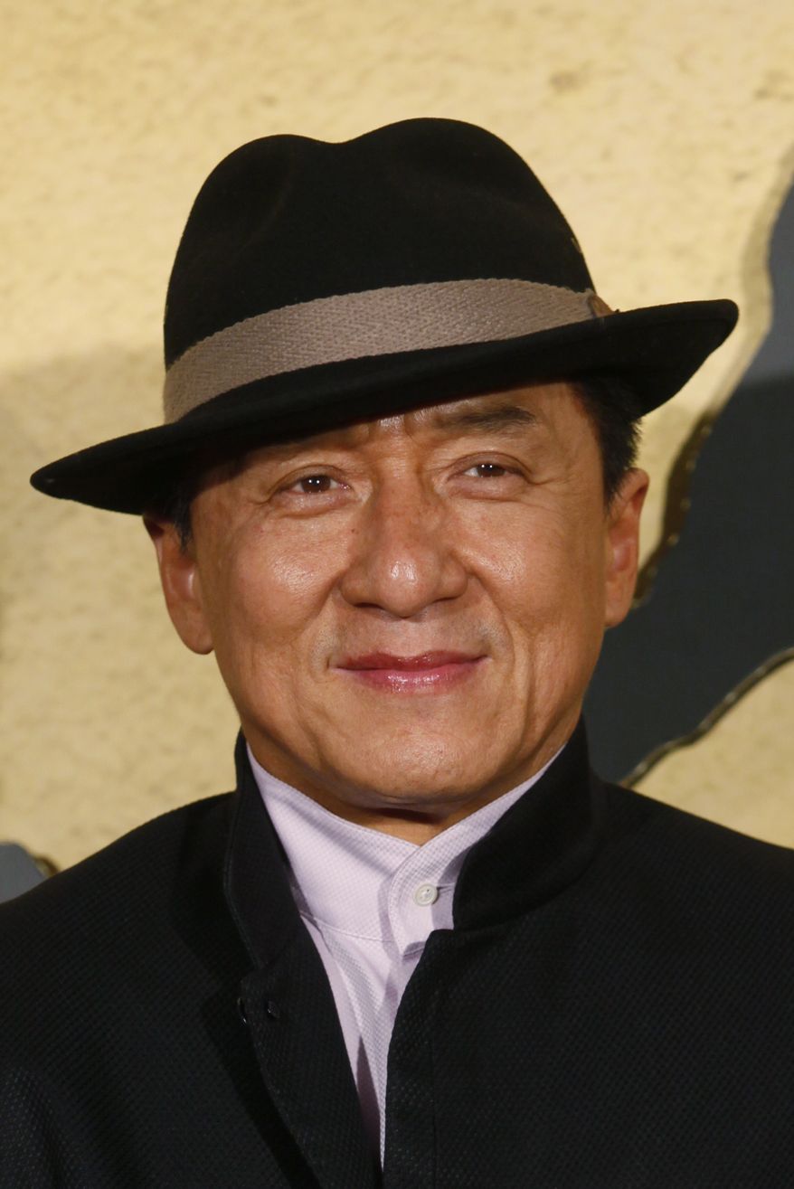 Movie star Jackie Chan poses for photographers during the charity premiere of his new movie "CZ12" in Hong Kong on Dec. 13, 2012. (Associated Press)