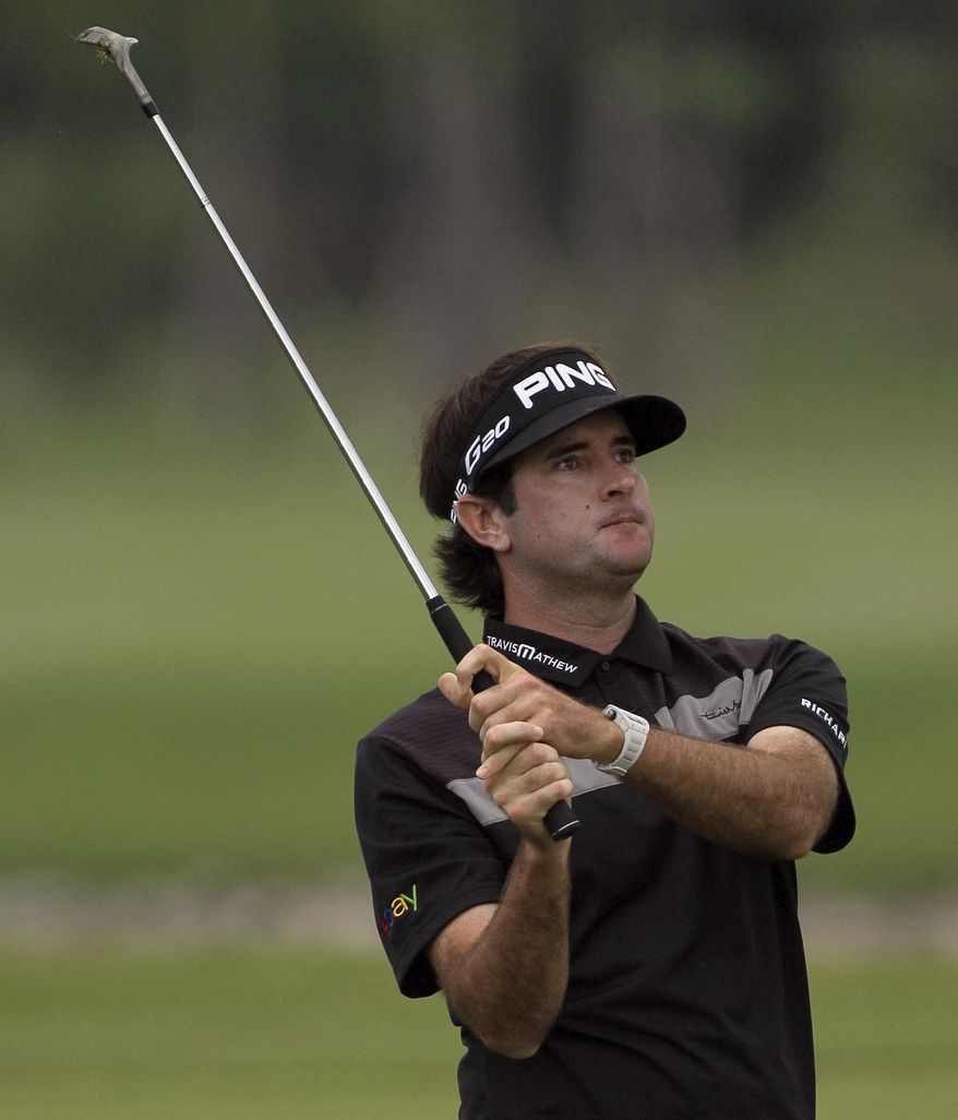 Bubba Watson of the U.S. plays a shot on fairway during the final round of the Thailand Golf Championship at the Amata Spring Country Club in Chonburi province, southeastern Thailand Sunday, Dec. 9, 2012. (AP Photo/Sakchai Lalit)