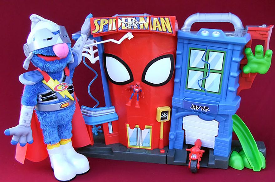 Gift ideas for the younger role players include Playskool's Flying Super Grover 2.0 and Hasbro's Spider-Man Stunt City. (Photograph by Joseph Szadkowski)