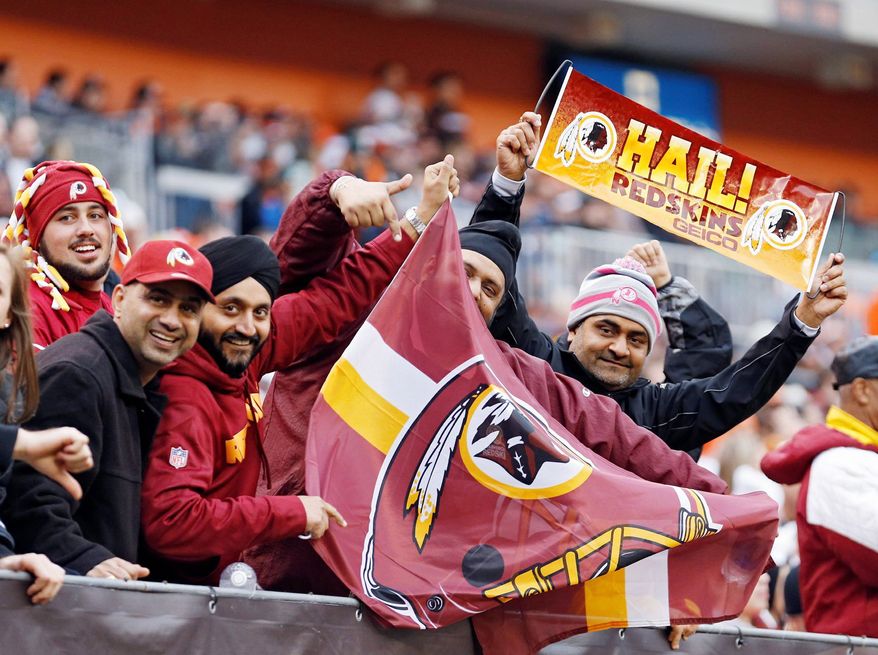 Redskins fans show their support at Cleveland Browns Stadium. Washington's 38-21 victory, the Redskins' fifth straight, made venturing into enemy territory all worth while. (AP Photo/Rick Osentoski)