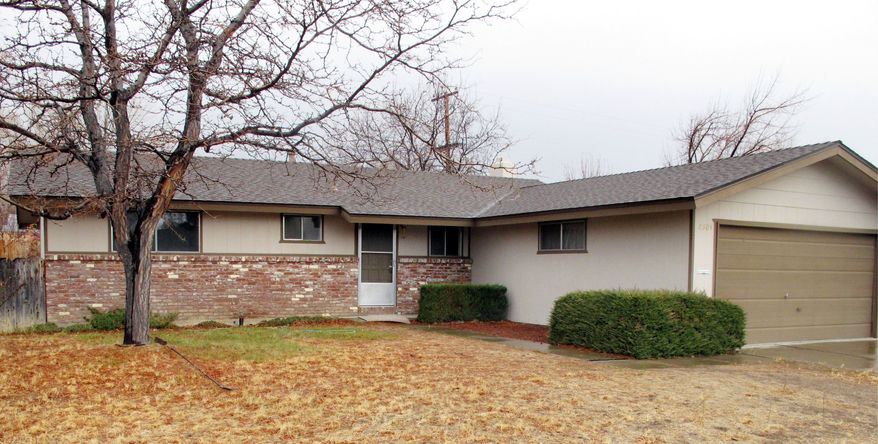 Walter Samaszko Jr., a loner who lived in this home until his death in June, kept more than $7.4 million worth of gold coins, bars and bullion in his garage. The house was sold at auction for $112,000, and the hidden treasure went to his lone surviving first cousin, a substitute teacher in San Rafael, Calif. (Associated Press)