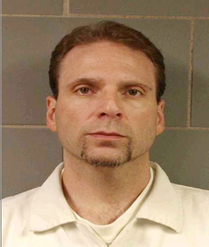 Kenneth Conley is one of two inmates who escaped from the Metropolitan Correctional Center in downtown Chicago on Tuesday, Dec. 18, 2012. (AP Photo/FBI)