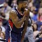 Atlanta Hawks guard DeShawn Stevenson reacts after hitting a 3-point shot in overtime of an NBA game against the Washington Wizards on Tuesday, Dec. 18, 2012, in Washington. The Hawks won 100-95. (AP Photo/Alex Brandon)