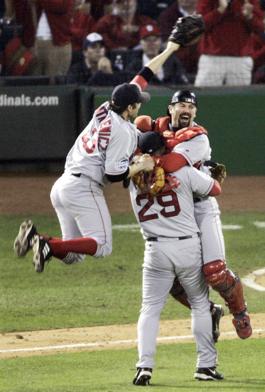 Red Sox celebrate a curse lifted in 2004. (AP Photo/Sue Ogrocki, File)