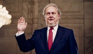 Judge Robert H. Bork, nominated by President Reagan to be an associate justice of the U.S. Supreme Court, is sworn before the Senate Judiciary Committee on Capitol Hill for his confirmation hearing on Sept. 15, 1987. (AP Photo/John Duricka)