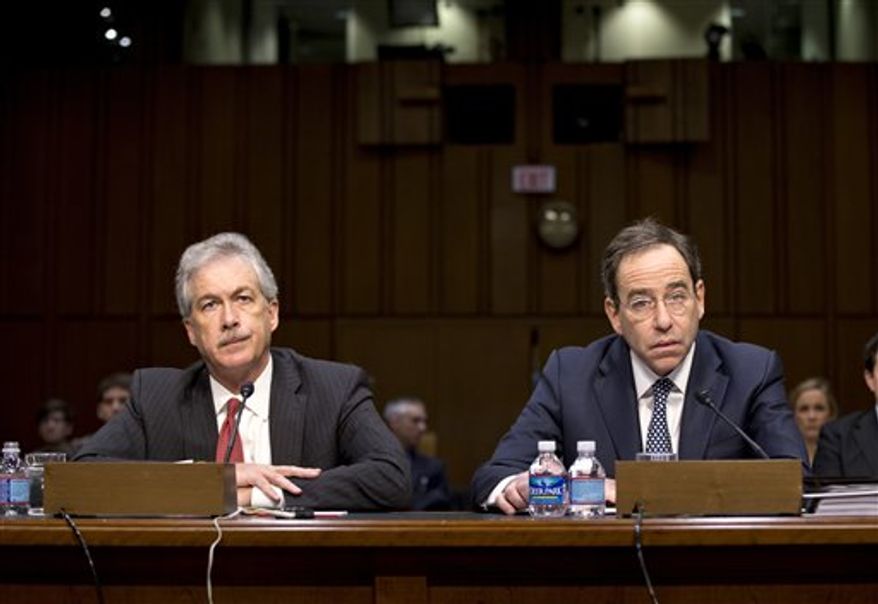 The Senate Foreign Relations Committee holds a hearing with Deputy Secretary of State William J. Burns (left), who is in charge of policy, and Deputy Secretary of State Thomas Nides (right), who is in charge of management, on Capitol Hill in Washington on Thursday, Dec. 20, 2012. The two testified regarding an independent review panel's report that said serious bureaucratic mismanagement was responsible for inadequate security at the mission in Benghazi, Libya, where the U.S. ambassador and three other Americans were killed on Sept. 11. (AP Photo/J. Scott Applewhite)
