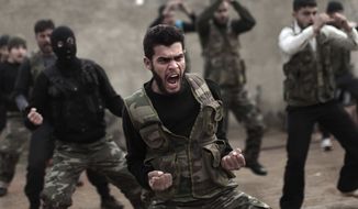 ** File ** Syrian rebels attend a training session in Maaret Ikhwan, near Idlib, Syria, Dec 17, 2012. (Associated Press)

