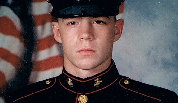 Former Marine Jon Hammar, who served combat tours in Afghanistan and Iraq, was arrested for illegally possessing an antique firearm even though he declared the gun to Mexican Customs agents. He is shown in an official 2003 USMC portrait. He could face up to 15 years in prison if convicted. (Photo courtesy Olivia Hammar)