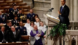 President Barack Obama speaks at the funeral service for the late Sen. Daniel Inouye, D-Hawaii, at the Washington National Cathedral, Friday, Dec. 21, 2012. (AP Photo/Charles Dharapak)