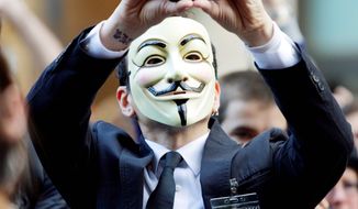 An &quot;Occupy Seattle&quot; protester wears a Guy Fawkes mask while demonstrating in October 2011. Guy Fawkes masks are featured prominently in &quot;V for Vendetta,&quot; which was telecast Friday in China. (Associated Press)