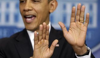 President Obama gestures as he speaks about &quot;fiscal cliff&quot; negotiations on Wednesday, Dec. 19, 2012, at the White House in Washington. (AP Photo/Charles Dharapak)