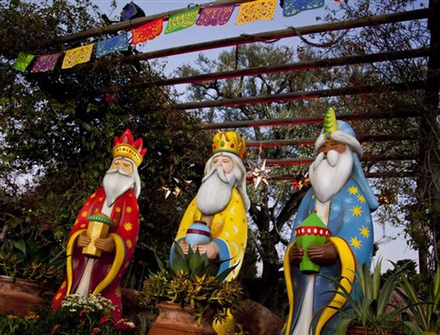 ** FILE ** This January 2012 publicity photo provided by Disneyland shows figures representing the Three Kings at a Three Kings Day celebration at the theme park in Anaheim, Calif. (AP Photo/Disneyland)