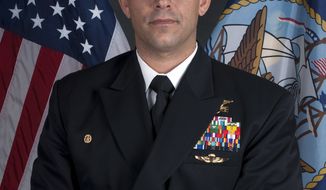 U.S. Navy Cmdr. Job W. Price, 42, of Pottstown, Pa., died on Saturday, Nov. 22, 2012, of an apparent self-inflicted gunshot wound to the head in Uruzgan Province in Afghanistan. (AP Photo/U.S. Navy)