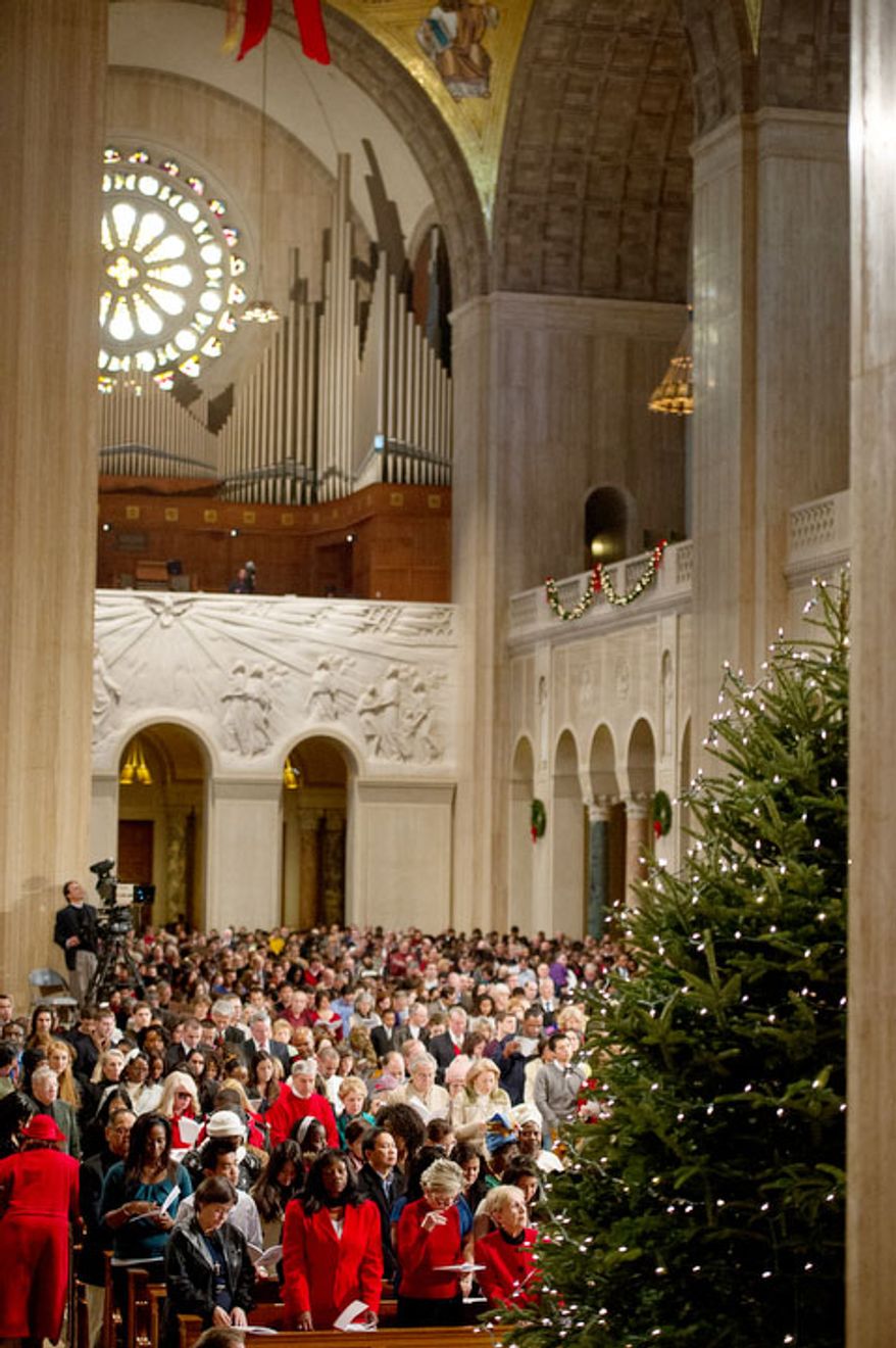 A congregation of 4,000 fill the main church as Archbishop of Washington Cardinal Donald Wuerl leads the Solemn Mass of Christmas Day at the Basilica of the National Shrine of the Immaculate Conception, Washington, D.C., Tuesday, December 25, 2012. (Andrew Harnik/The Washington Times)