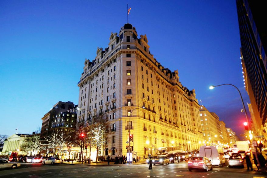 The Willard Hotel is seen at dusk in Washington. At the Willard, about a block from the White House, rooms are still available for the presidential inauguration starting at more than $1,100 a night with a four-night minimum. That means every guest will pay more than President Abraham Lincoln did when he checked out after his 1861 inauguration and paid $773.75 for a stay of more than a week. (AP Photo/Jacquelyn Martin)