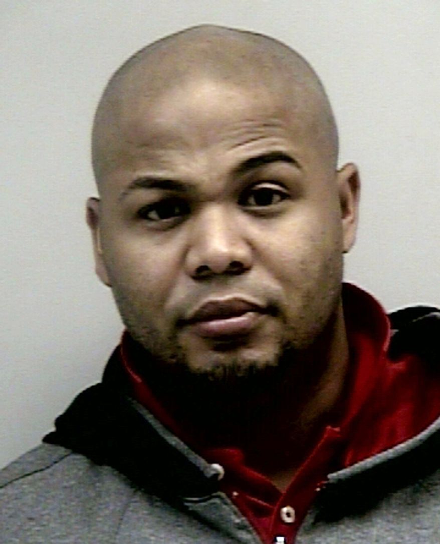 This booking photo provided by the Gwinnett County Sheriff's Department on Dec. 25, 2012, shows former Atlanta Braves center fielder Andruw Jones. Jail records show that Jones is free on bond after being arrested in suburban Atlanta on a battery charge. (Associated Press/Gwinnett County Sheriff's Department)