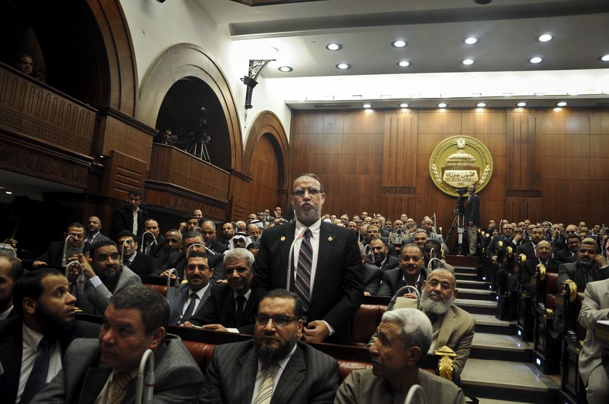 Essam el-Erian, vice chairman of the Freedom and Justice party, speaks during a session at the Shura Council building in Cairo on Dec. 26, 2012. The official approval of Egypt's disputed, Islamist-backed constitution the previous day held out little hope of stabilizing the country after two years of turmoil, and Islamist President Mohammed Morsi now may face a more immediate crisis with the economy falling deeper into distress. (Associated Press)