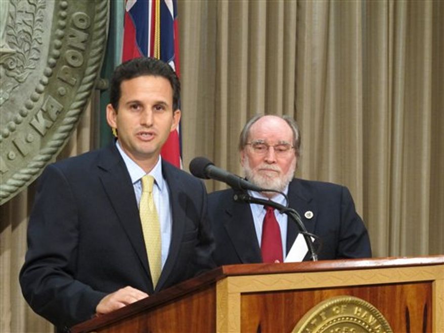 Hawaii Lt. Gov. Brian Schatz speaks the state Capitol in Honolulu on Wednesday, Dec. 26. 2012 after Gov. Neil Abercrombie, right, announced he was appointing Schatz to fill the seat vacated by the late U.S. Sen. Daniel Inouye. (Associated Press)