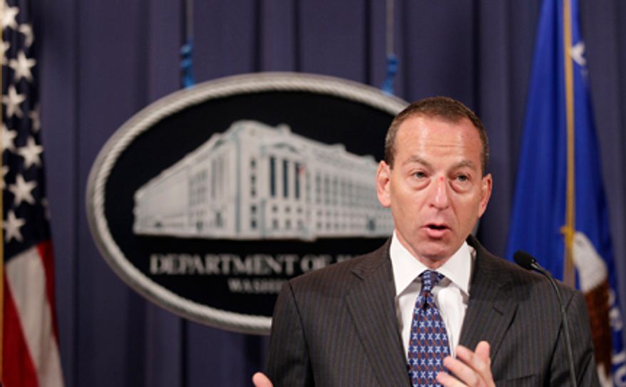**FILE** Assistant Attorney General Lanny Breuer speaks Oct. 4, 2010, during a news conference at the Justice Department in Washington. (Associated Press)
