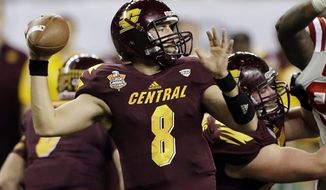 Central Michigan quarterback Ryan Radcliff (8) prepares to pass during the first quarter of the Little Caesars Pizza Bowl NCAA college football game against Western Kentucky at Ford Field in Detroit, Wednesday, Dec. 26, 2012. (AP Photo/Carlos Osorio)
