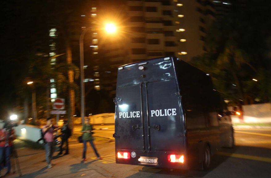 A police hearse leaves Mount Elizabeth Hospital on Saturday Dec. 29, 2012, in Singapore. A young Indian woman who was gang-raped and severely beaten on a bus in New Delhi died Saturday at the hospital, after her horrific ordeal galvanized Indians to demand greater protection from sexual violence that impacts thousands of women daily, but which often goes unreported. (AP Photo/Wong Maye-E)