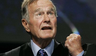 ** FILE ** In this Sept. 21, 2006, file photo, former President George H.W. Bush delivers the keynote speech before receiving an honorary Doctor of Public Administration degree at Suffolk University in Boston. (AP Photo/Elise Amendola, Pool, File)