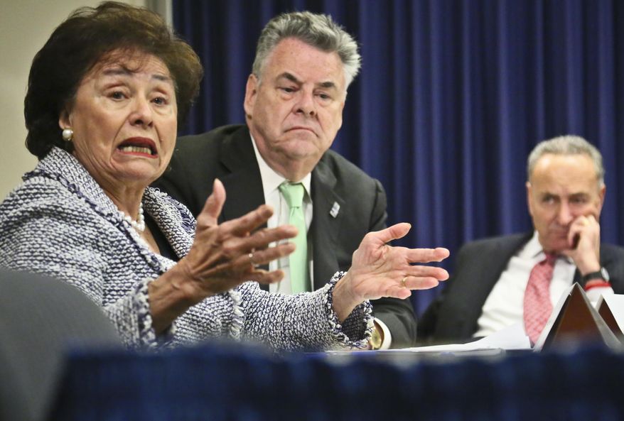 ** FILE ** Congressman Peter King, center, and Sen. Chuck Schumer, right, listens as Congresswoman Nita Lowey speaks during a news conference, Friday, Dec. 14, 2012 in New York. (AP Photo/Bebeto Matthews)