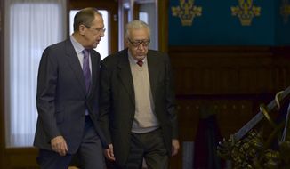 Russian Foreign Minister Sergey Lavrov, left, and U.N. envoy for Syria Lakhdar Brahimi talk during their meeting in Moscow, Russia, on Saturday, Dec. 29, 2012. (AP Photo/Ivan Sekretarev)