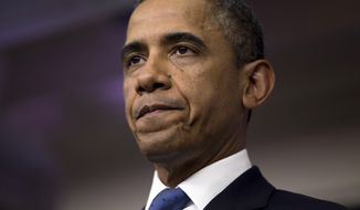 President Obama pauses during a statement on the &quot;fiscal cliff&quot; negotiations with congressional leaders at the White House on Friday, Dec. 28, 2012, in Washington. (AP Photo/Evan Vucci)