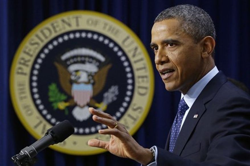 President Obama gestures as he speaks about the fiscal cliff, Monday, Dec. 31, 2012, in the South Court Auditorium at the White House in Washington. The president said it appears that an agreement to avoid the fiscal cliff is "in sight," but says it's not yet complete and work continues. (AP Photo/Charles Dharapak)