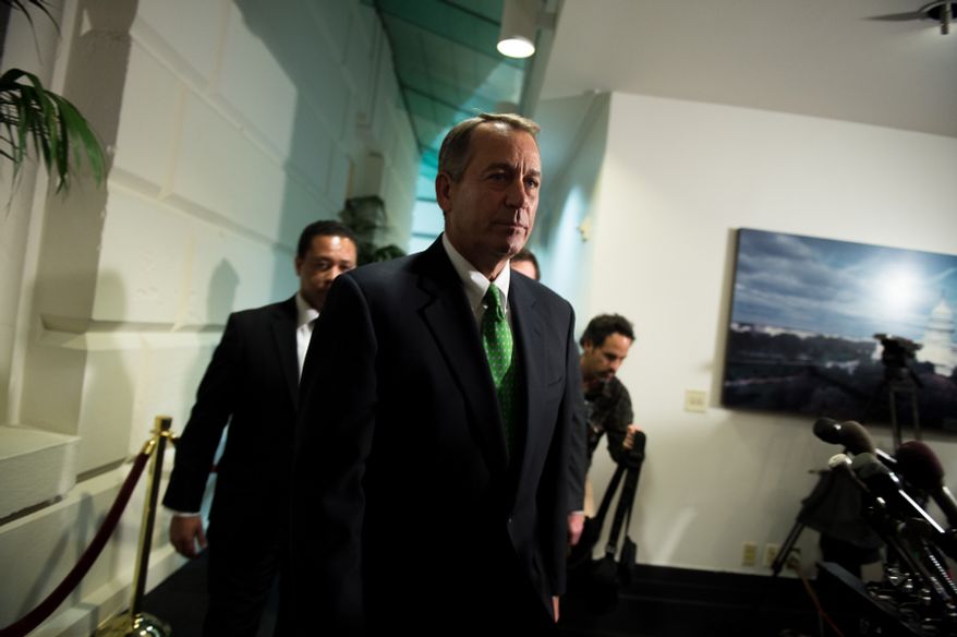 House Speaker John A. Boehner leaves a GOP caucus meeting on "fiscal cliff" legislation at the U.S. Capitol in Washington on Tuesday, Jan. 1, 2013. (Andrew Harnik/The Washington Times)