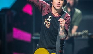 Billie Joe Armstrong of Green Day performs at the iHeart Radio Music Festival at the MGM Grand Arena in Las Vegas on Friday, Sept. 21, 2012. (Eric Reed/Invision/AP)