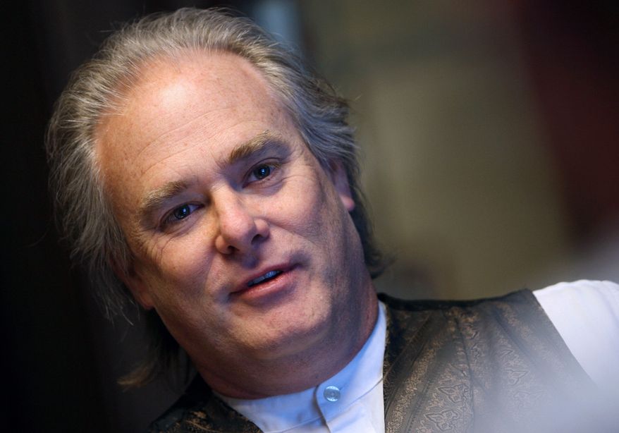 William Marotta, who Kansas says must pay child support after providing sperm to a same-sex couple, speaks at his attorney's office in Topeka, Kan., on Monday, Dec. 31, 2012. (AP Photo/The Topeka Capital-Journal, Jeff Davis)