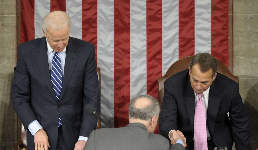 In this photo from Jan. 4, 2013, Vice President Joseph R. Biden watches at left as Sen. Charles Schumer, D-N.Y., center, shakes hands with House Speaker John Boehner of Ohio, right, in the House Chamber during the counting of Electoral College votes on Capitol Hill in Washington. Biden presided over a Joint Session of Congress Friday as four members of the House and Senate took turns announcing the votes that had been tallied in state capitals last month affirming the re-election of Barack Obama as President of the United States. (AP Photo/Susan Walsh)